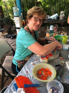 Nancy working on her mosaic bird